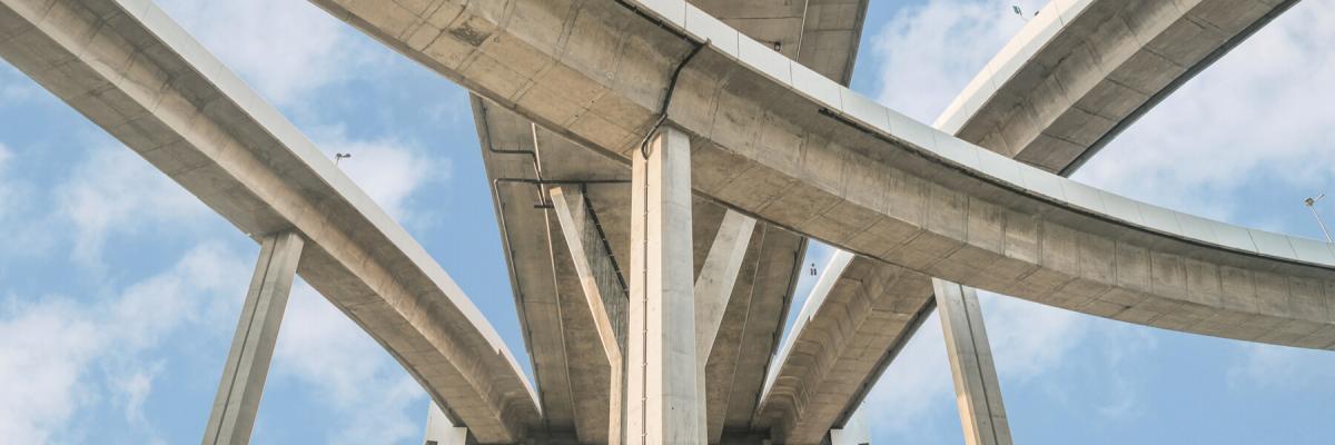 view of the bottom or underside of a concrete bridge
